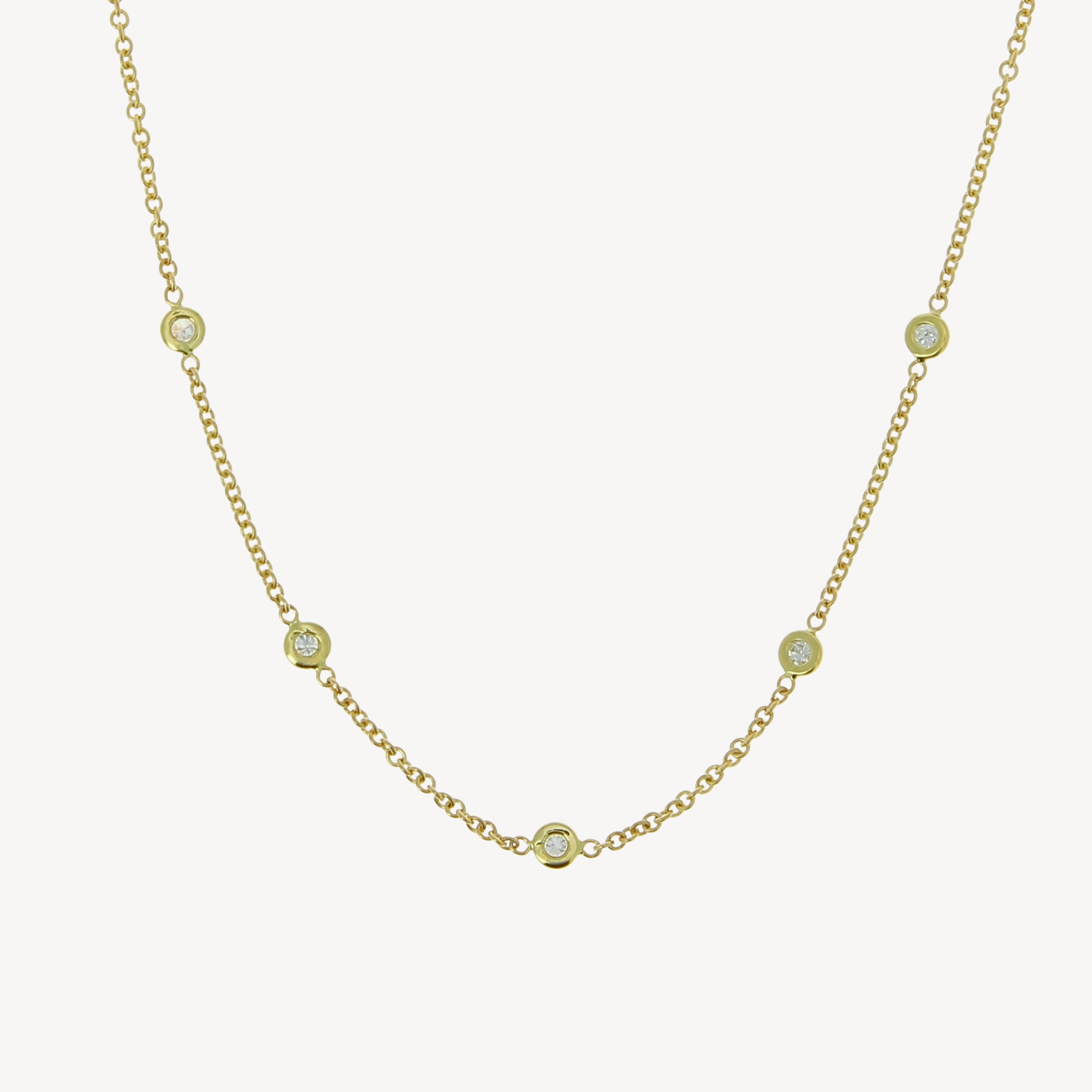 5 spaced out diamond necklace