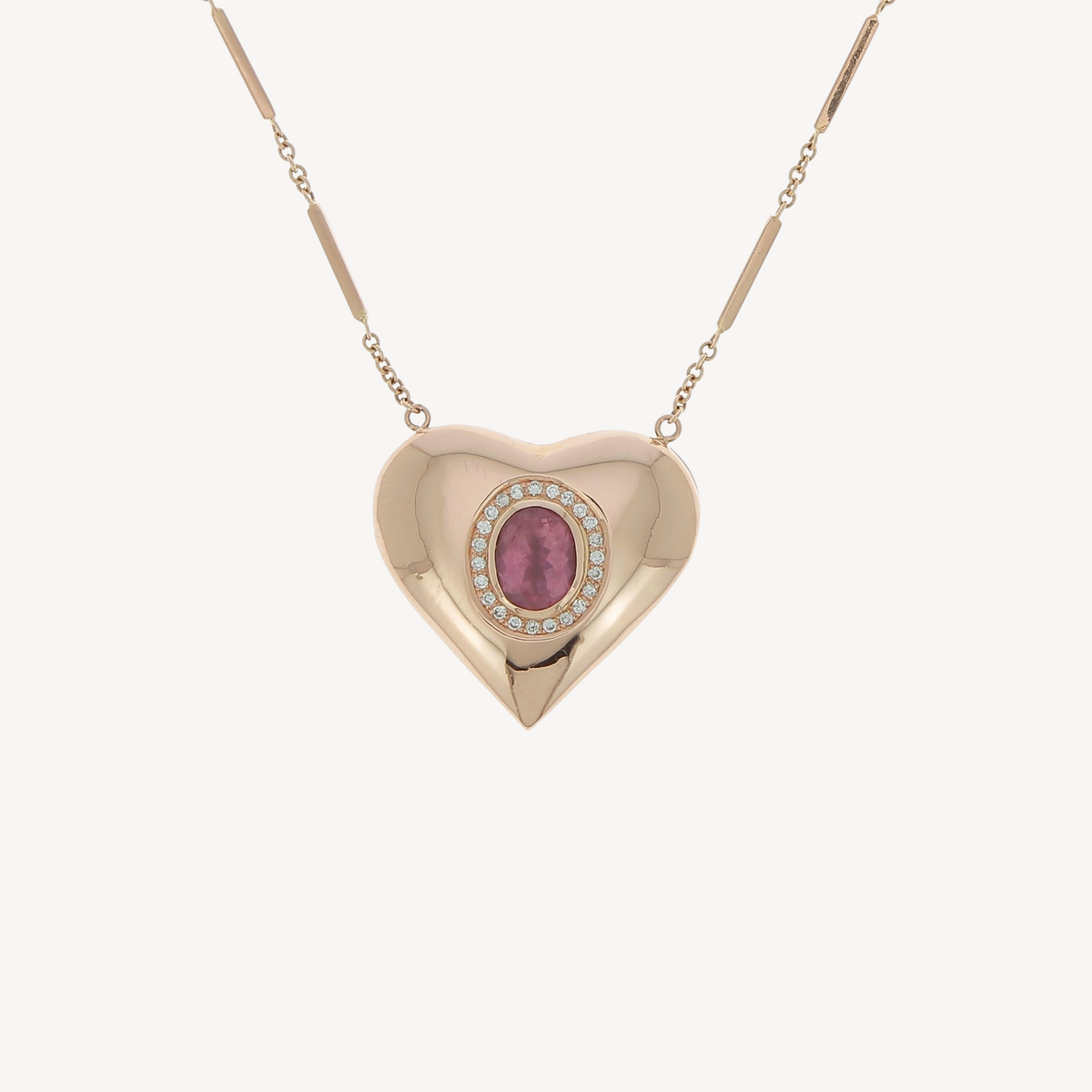 Pink tourmaline oval with pave diamond heart necklace