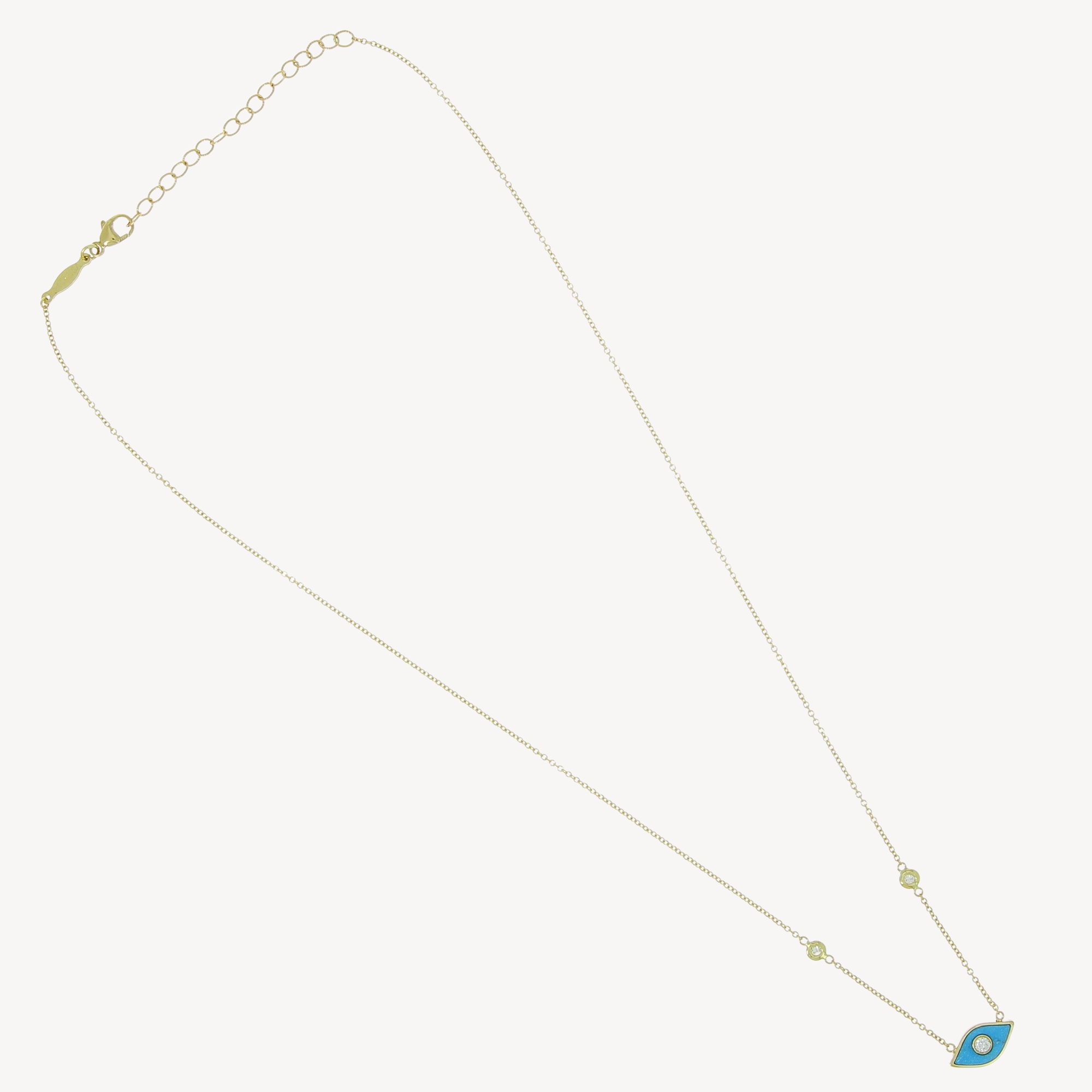 Yellow gold diamond center turquoise eye necklace